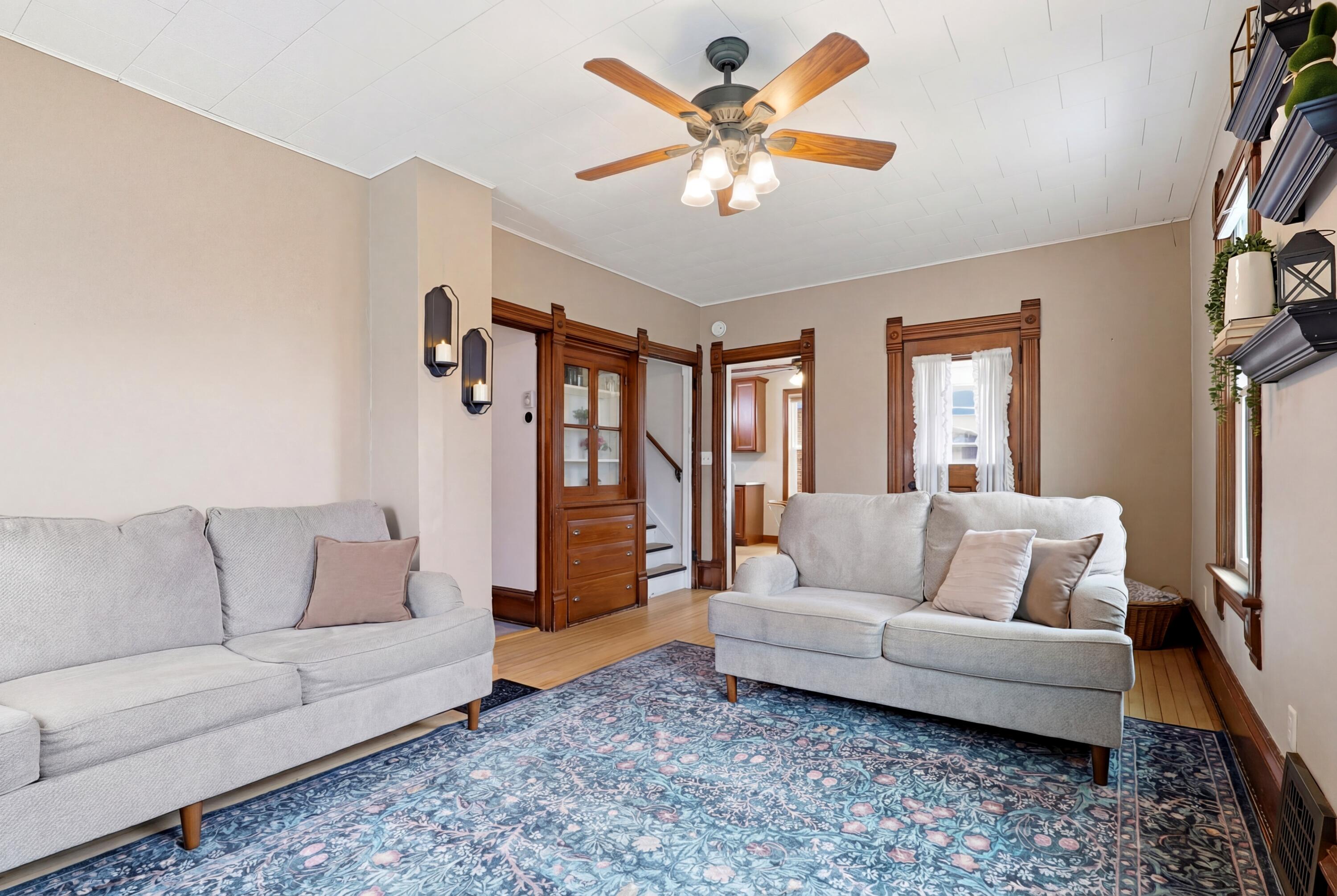 326 Butler Street Random Lake, WI 53075 - Photo 7 of 35 Living Room with Original Woodwork