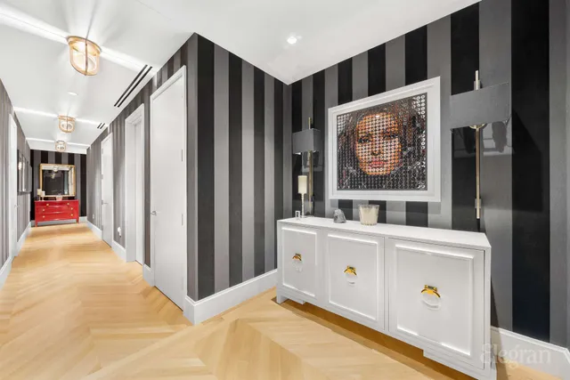 a view of an entryway with wooden floor