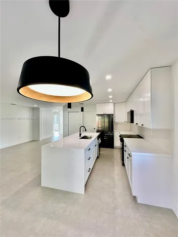 an empty room with a large window