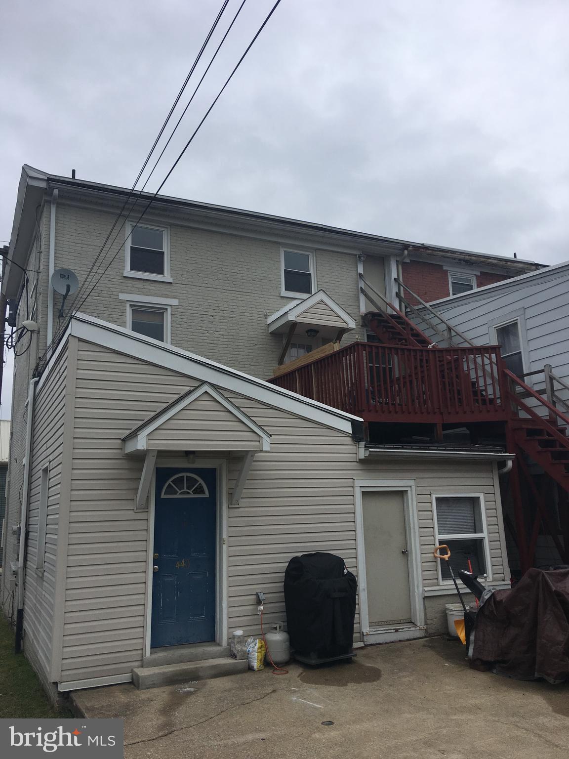 440 Market Street New Cumberland, PA 17070 - Photo 4 of 10 a front view of a house with parking space