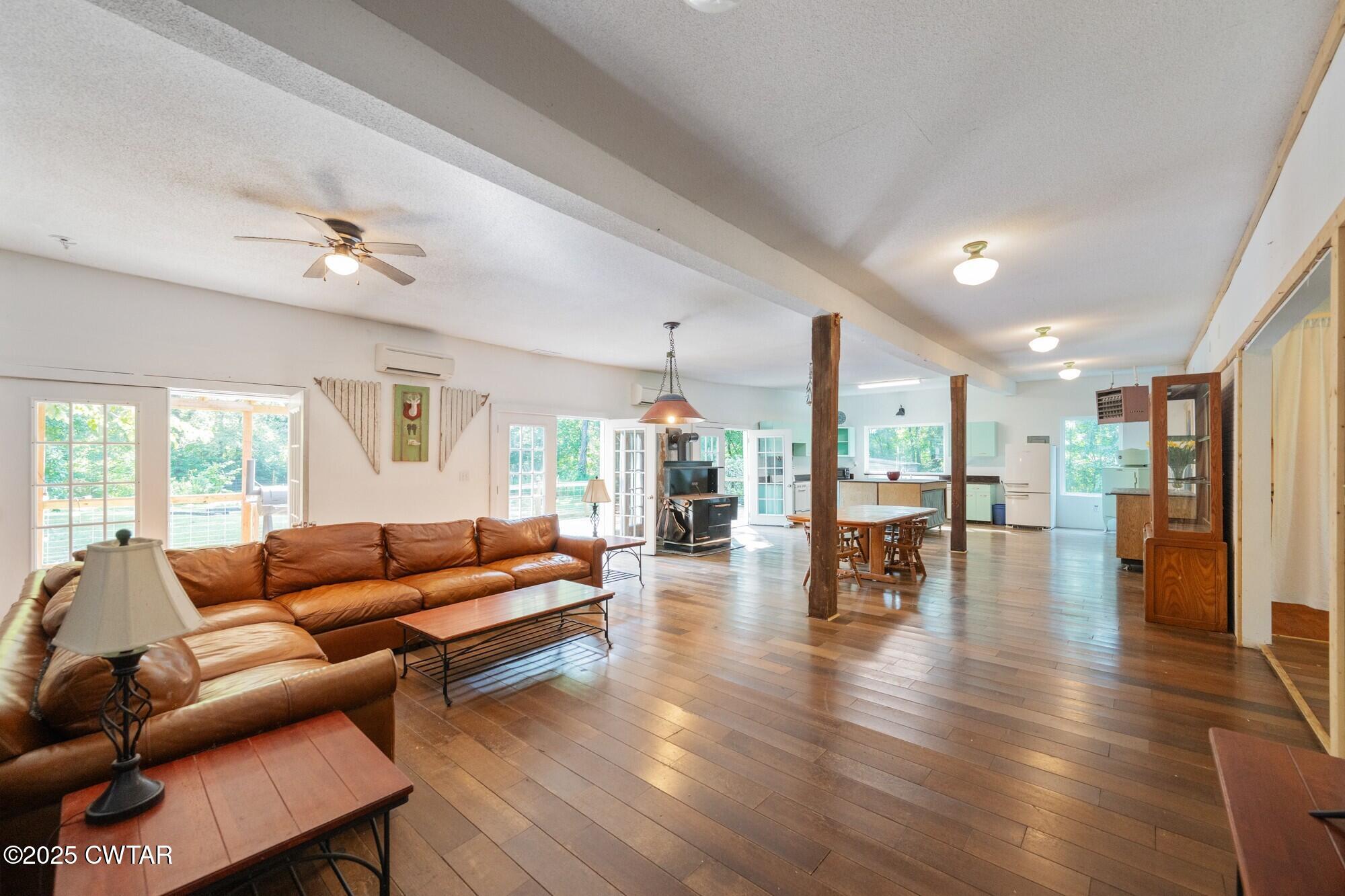1035 Beacon Road Parsons, TN 38363 - Photo 13 of 70 a living room with furniture and wooden floor
