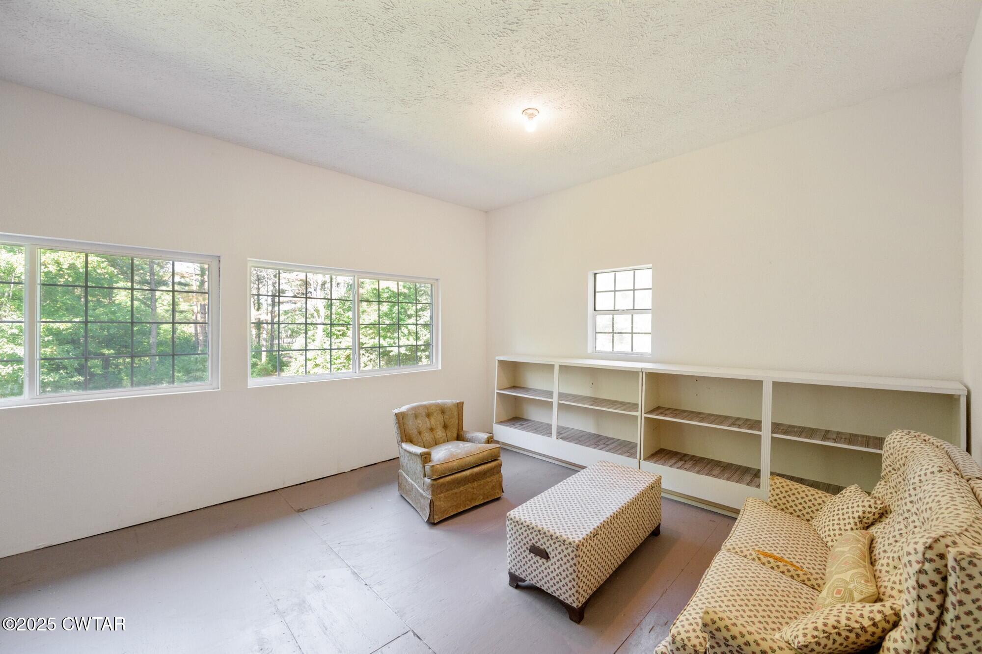 1035 Beacon Road Parsons, TN 38363 - Photo 32 of 70 a living room with furniture and a window