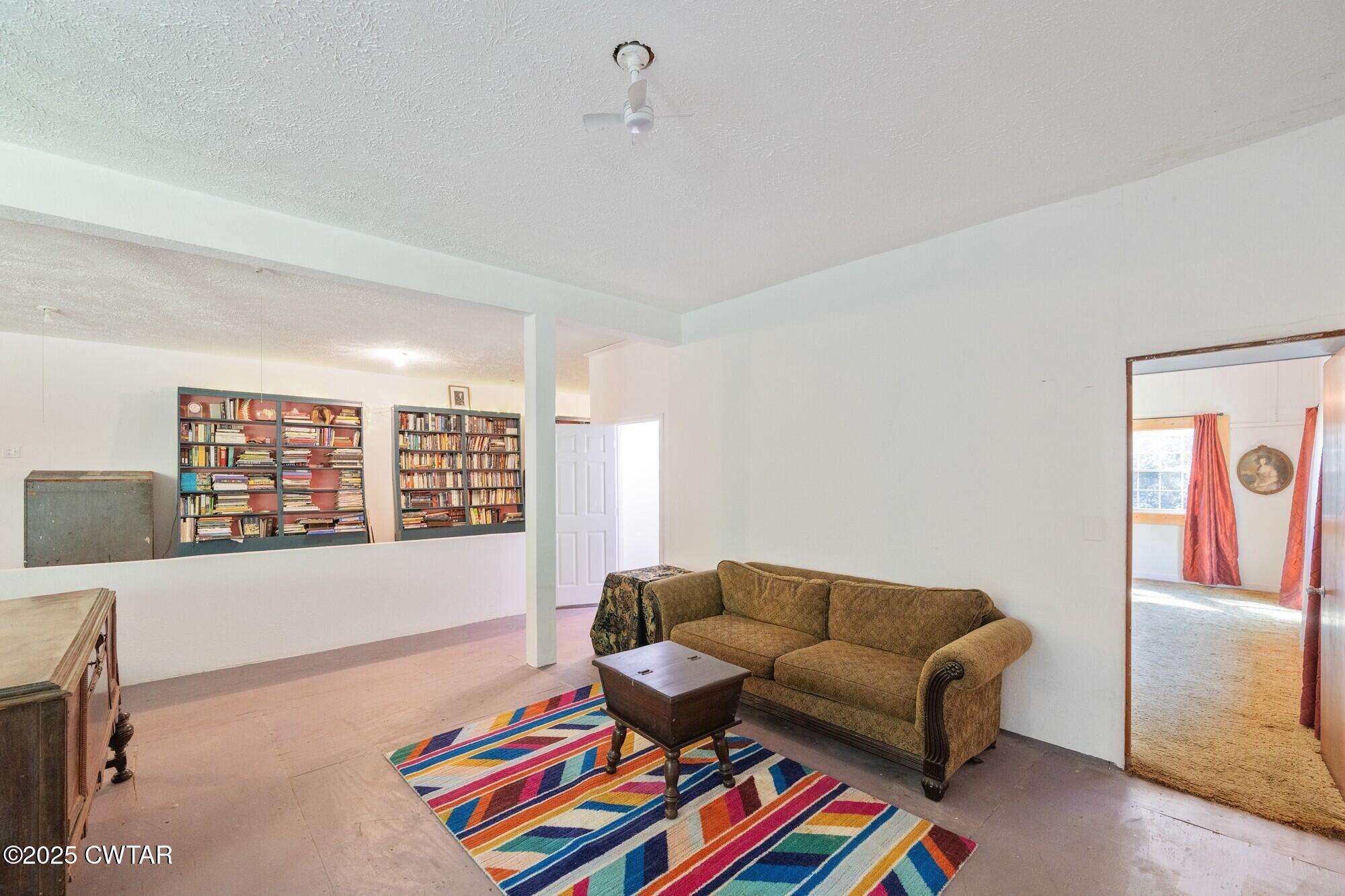 1035 Beacon Road Parsons, TN 38363 - Photo 35 of 70 a living room with furniture and a window