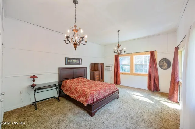 a view of a back yard from a balcony