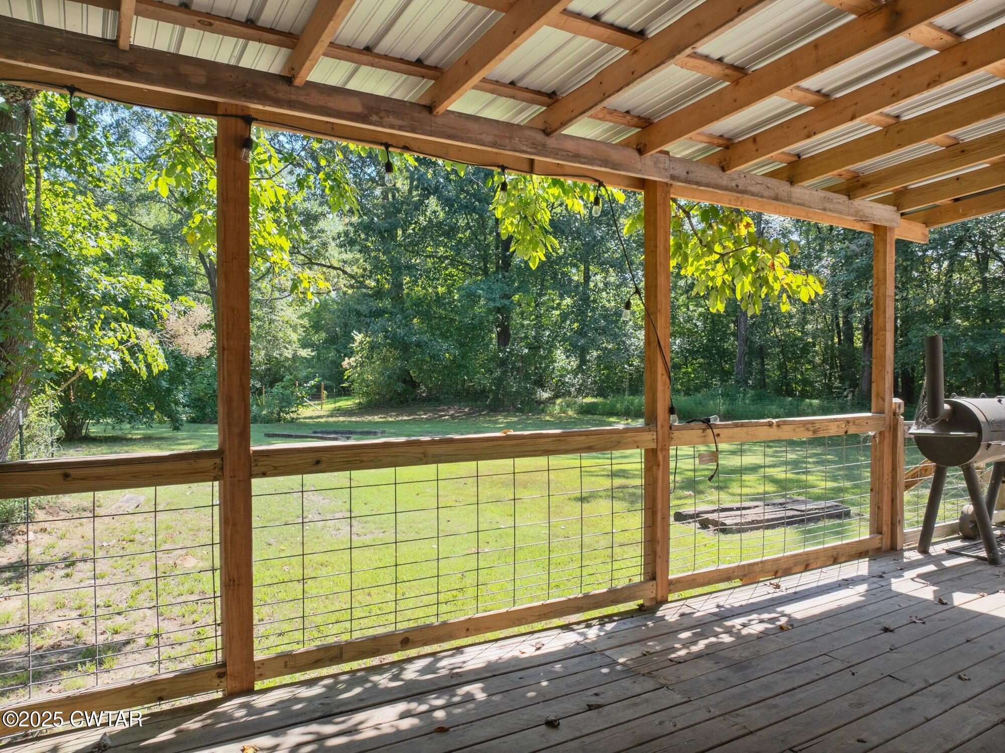 1035 Beacon Road Parsons, TN 38363 - Photo 53 of 70 a view of outdoor space with deck and wooden floor