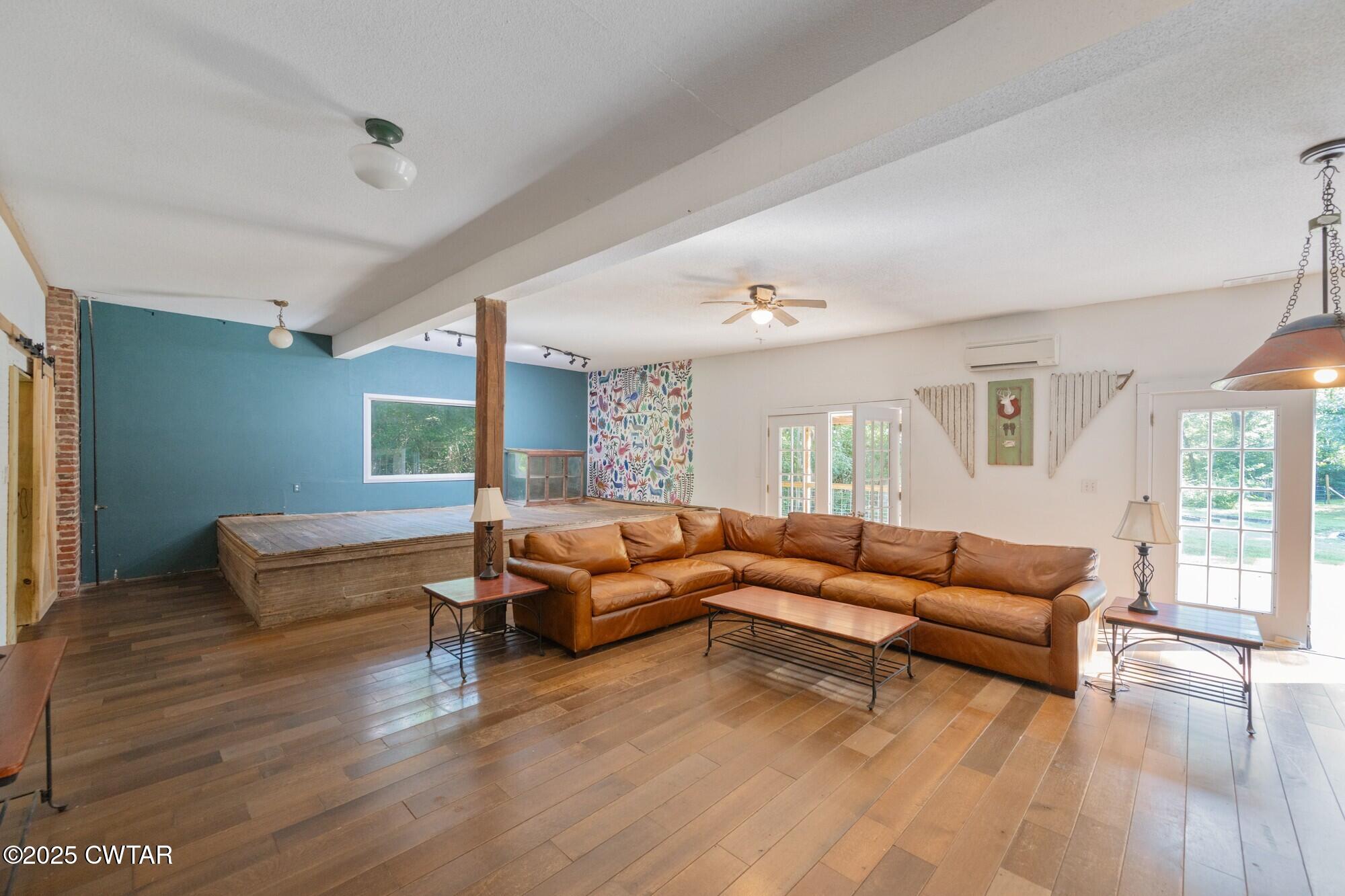 1035 Beacon Road Parsons, TN 38363 - Photo 7 of 70 a living room with furniture and a large window
