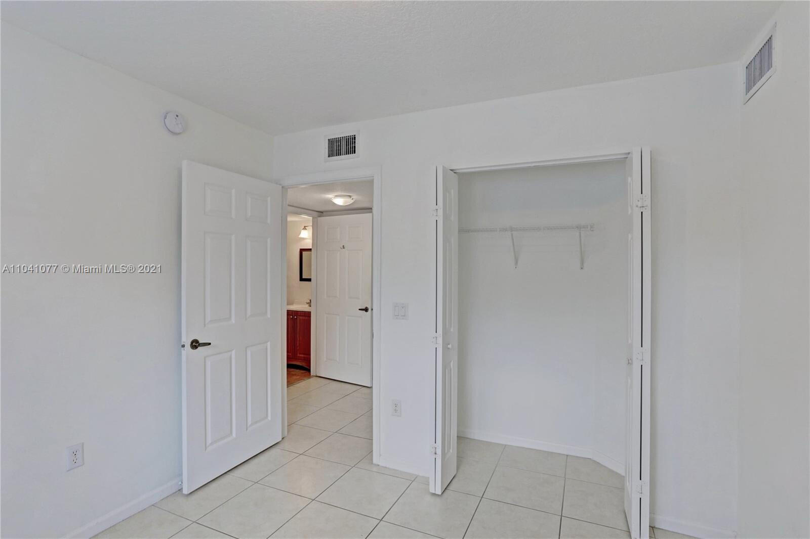 3810 North Jog Road, Unit 106 West Palm Beach, FL 33411 - Photo 11 of 13 a view of an empty room