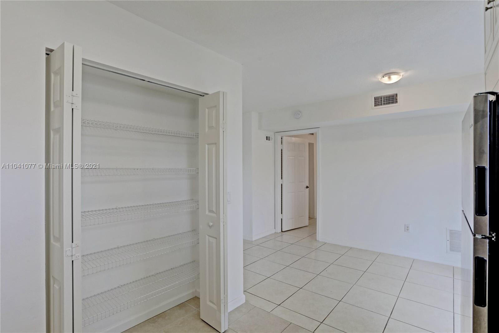 3810 North Jog Road, Unit 106 West Palm Beach, FL 33411 - Photo 12 of 13 a view of an empty room