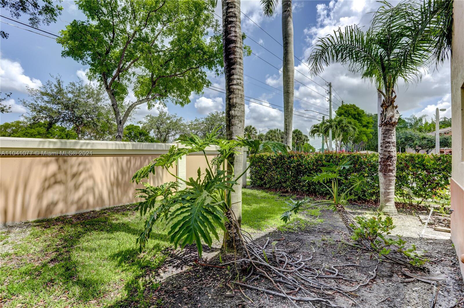 3810 North Jog Road, Unit 106 West Palm Beach, FL 33411 - Photo 13 of 13 a garden view