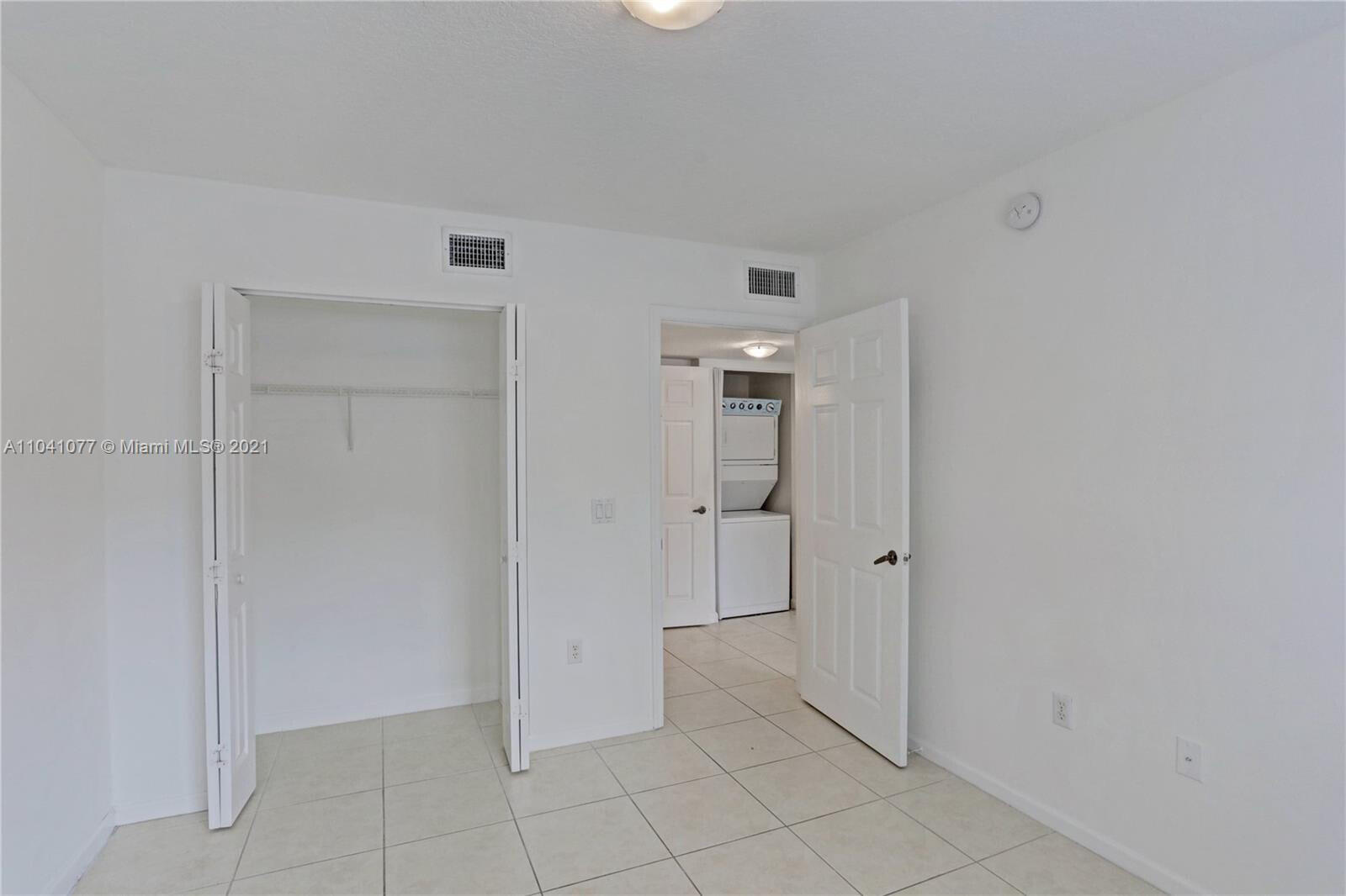 3810 North Jog Road, Unit 106 West Palm Beach, FL 33411 - Photo 9 of 13 a view of an empty room