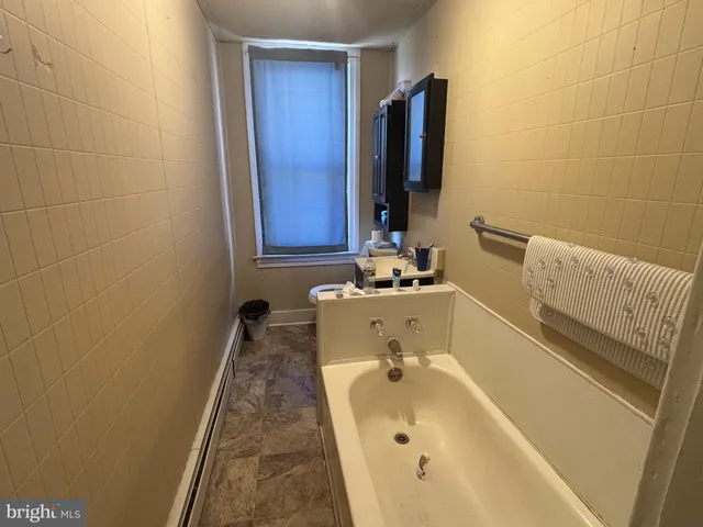 a bathroom with a sink and a tub
