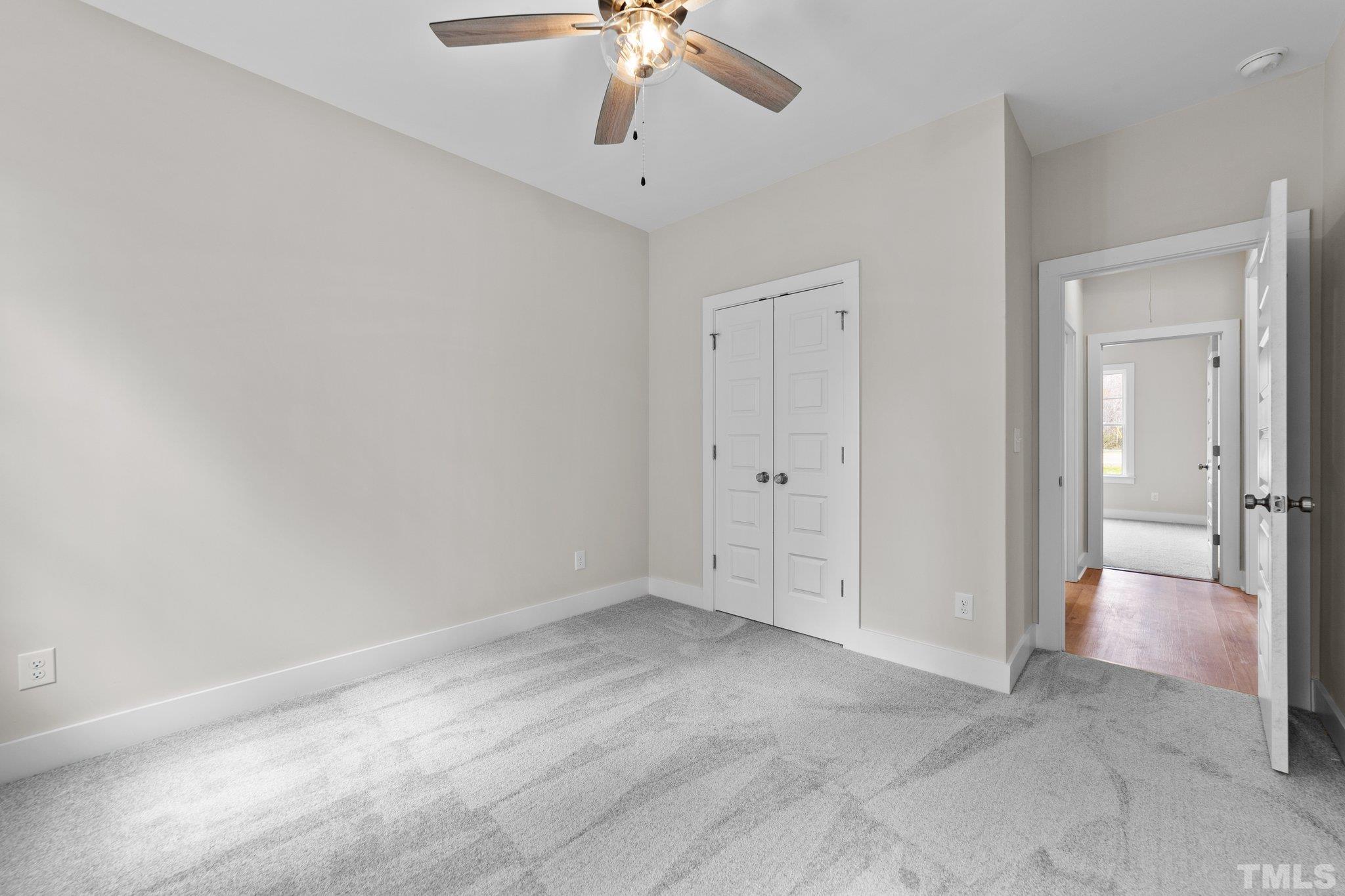 2748 Antioch Church Road Timberlake, NC 27583 - Photo 32 of 45 wooden floor in an empty room