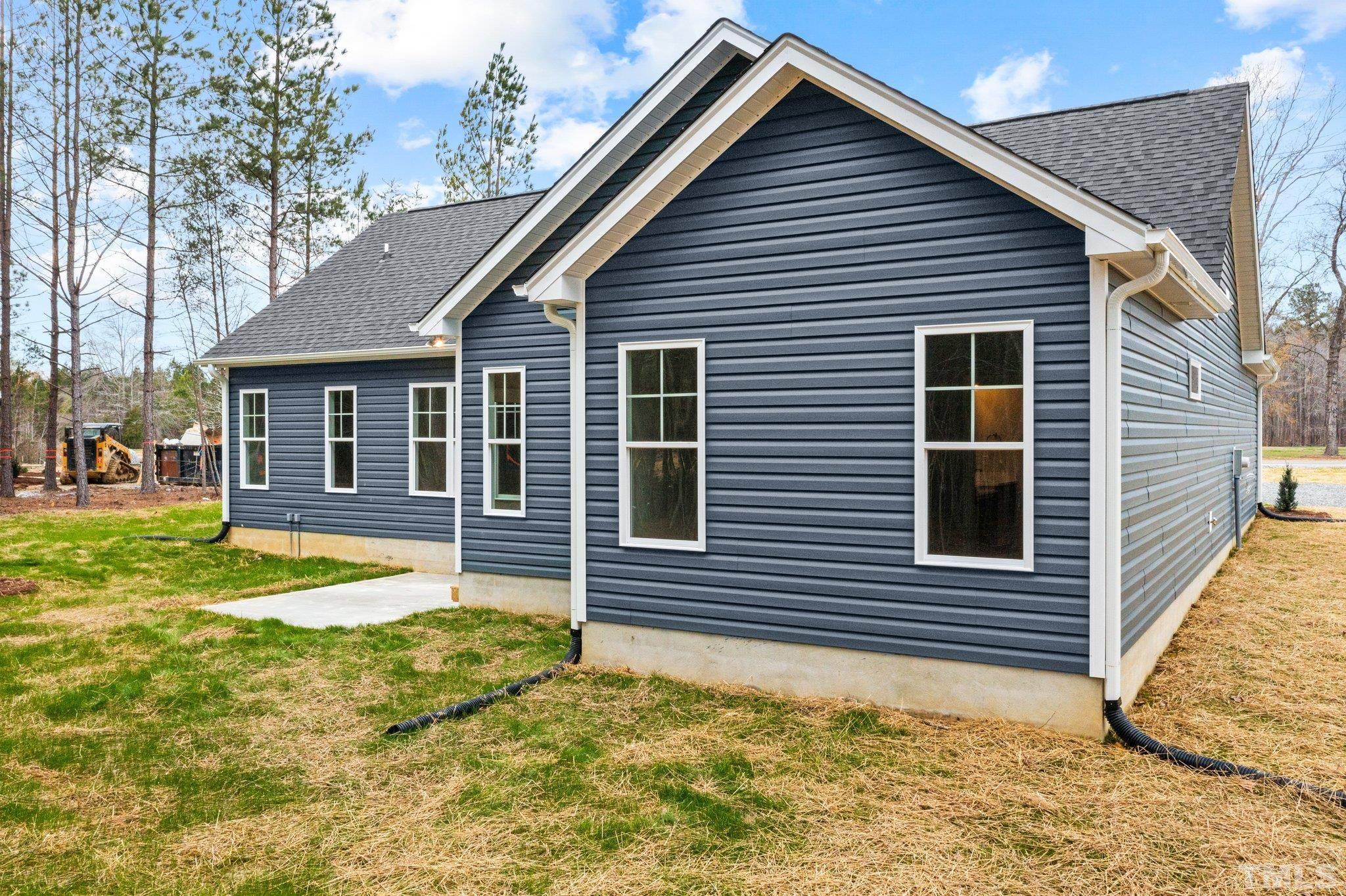 2748 Antioch Church Road Timberlake, NC 27583 - Photo 44 of 45 a front view of a house with a yard