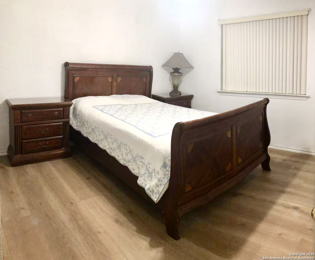 11023 Falling Water San Antonio, TX 78249 - Photo 25 of 30 a bedroom with a bed and a dresser