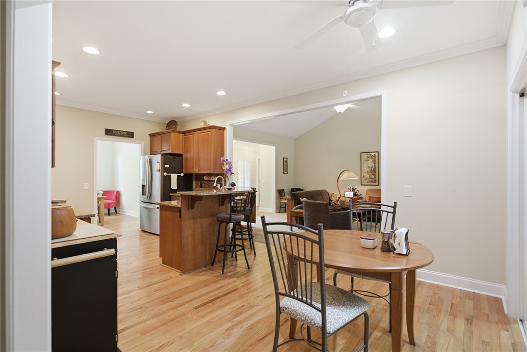 106 Cardinal Drive Seneca, SC 29672 - Photo 19 of 48 Bright, open-concept living space with a functional kitchen and dining area.
