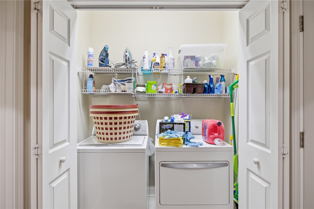 106 Cardinal Drive Seneca, SC 29672 - Photo 25 of 48 This dedicated space features a washer and dryer for effortless household chores.