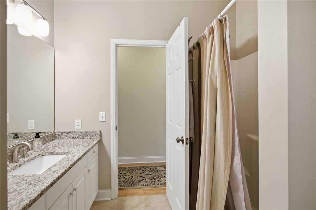 106 Cardinal Drive Seneca, SC 29672 - Photo 34 of 48 This bright bathroom features a spacious vanity and ample natural light.