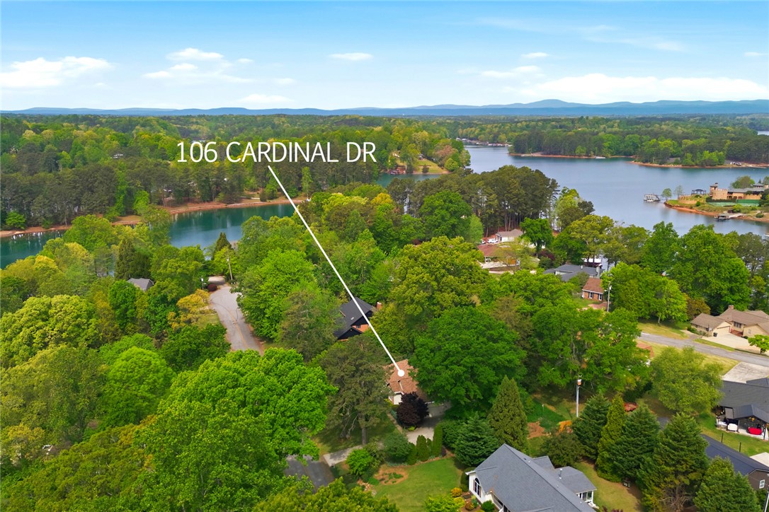 106 Cardinal Drive Seneca, SC 29672 - Photo 45 of 48 Perched on a sprawling lot, this property offers verdant views and serene waterside living.