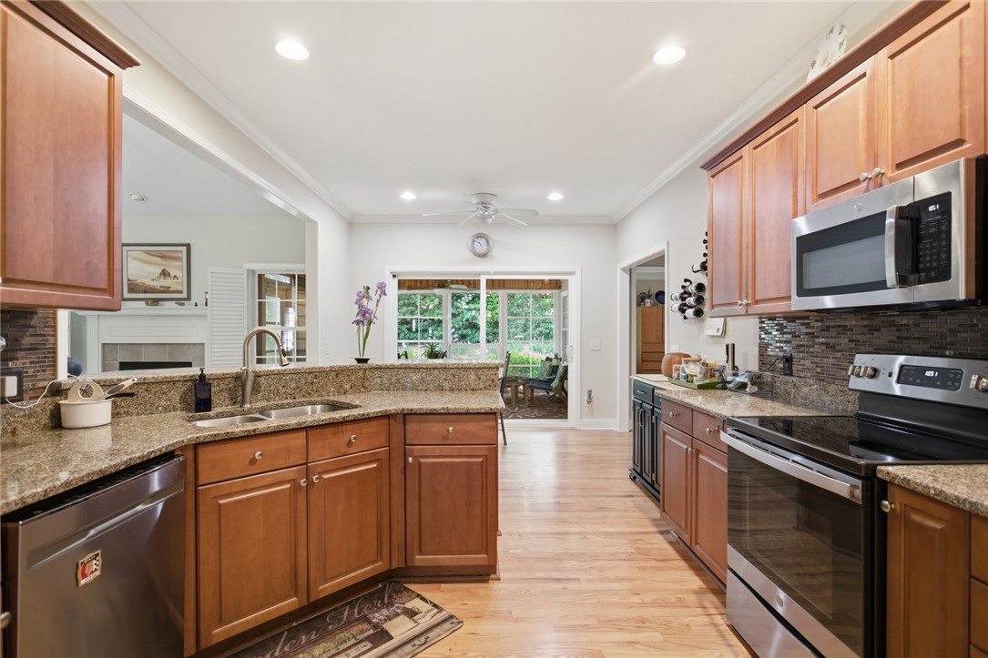 106 Cardinal Drive Seneca, SC 29672 - Photo 10 of 48 This spacious kitchen offers a seamless flow into the living area, perfect for entertaining.