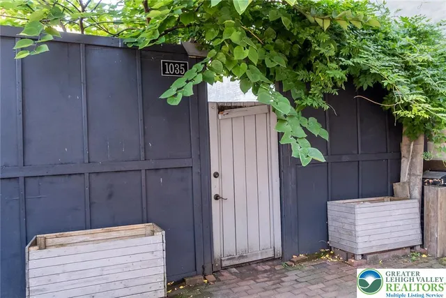 a house with trees in front of it