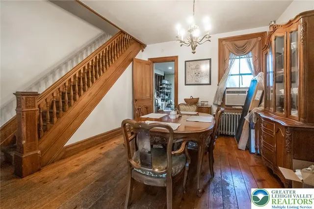 a kitchen with stainless steel appliances a refrigerator sink and stove