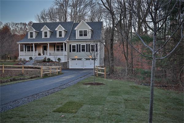 25 Robinson Road Lexington, MA 02420 - Photo 1 of 29 a front view of a house with a yard
