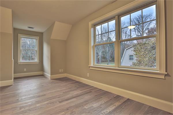25 Robinson Road Lexington, MA 02420 - Photo 15 of 29 a view of an empty room with wooden floor and a window