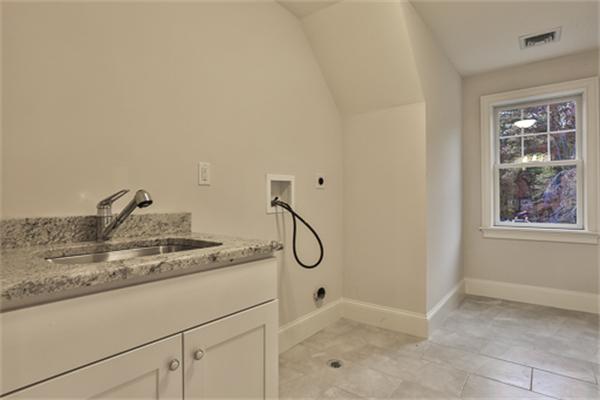 25 Robinson Road Lexington, MA 02420 - Photo 17 of 29 a bathroom with a granite countertop sink and a mirror