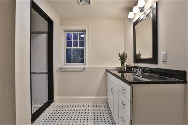 25 Robinson Road Lexington, MA 02420 - Photo 23 of 29 a bathroom with a sink a vanity and a mirror