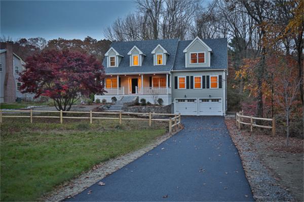25 Robinson Road Lexington, MA 02420 - Photo 29 of 29 a front view of a house with a yard and lake view