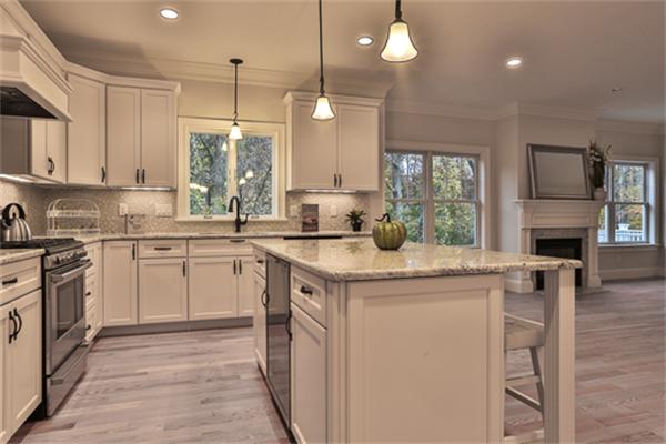 25 Robinson Road Lexington, MA 02420 - Photo 5 of 29 a kitchen with a sink stove and cabinets