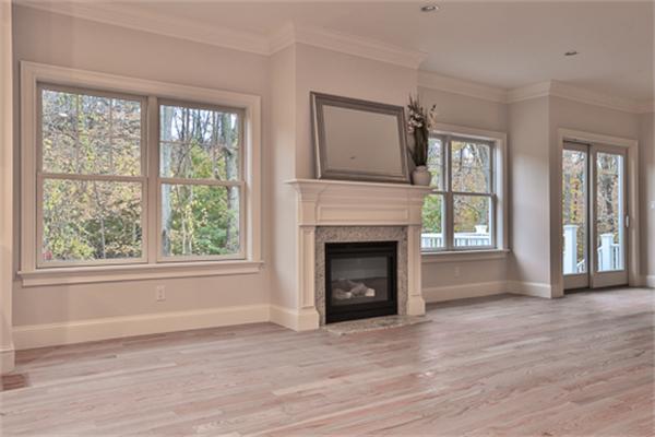 25 Robinson Road Lexington, MA 02420 - Photo 7 of 29 wooden floor fireplace and windows in an empty room