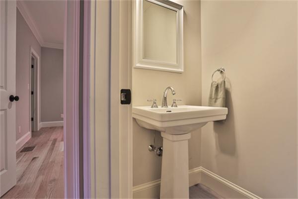25 Robinson Road Lexington, MA 02420 - Photo 9 of 29 a bathroom with a sink and a mirror