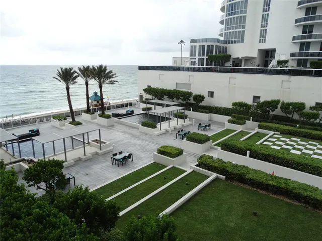 a view of a balcony with an outdoor space