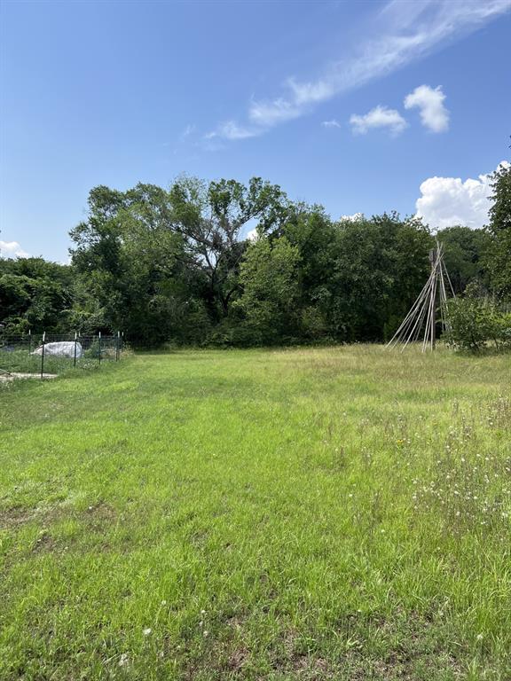 7190 Darling Street Azle, TX 76020 - Photo 1 of 1 a view of a field with a yard
