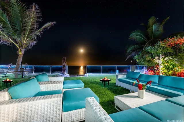 a view of a swimming pool with a patio