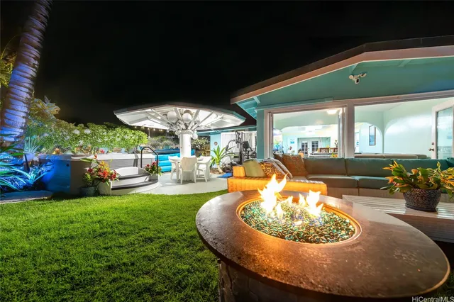 a view of a yard with an outdoor space