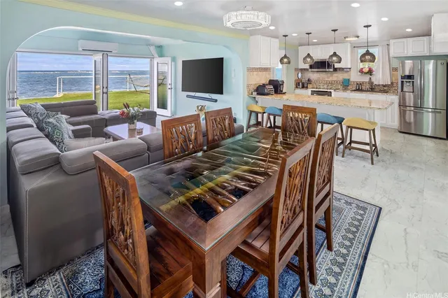 a view of a dining room with furniture