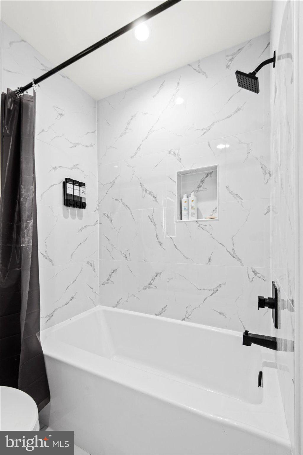 7206 Castaway Beach Road Orange, VA 22960 - Photo 42 of 64 Tub and shower with modern black fixtures