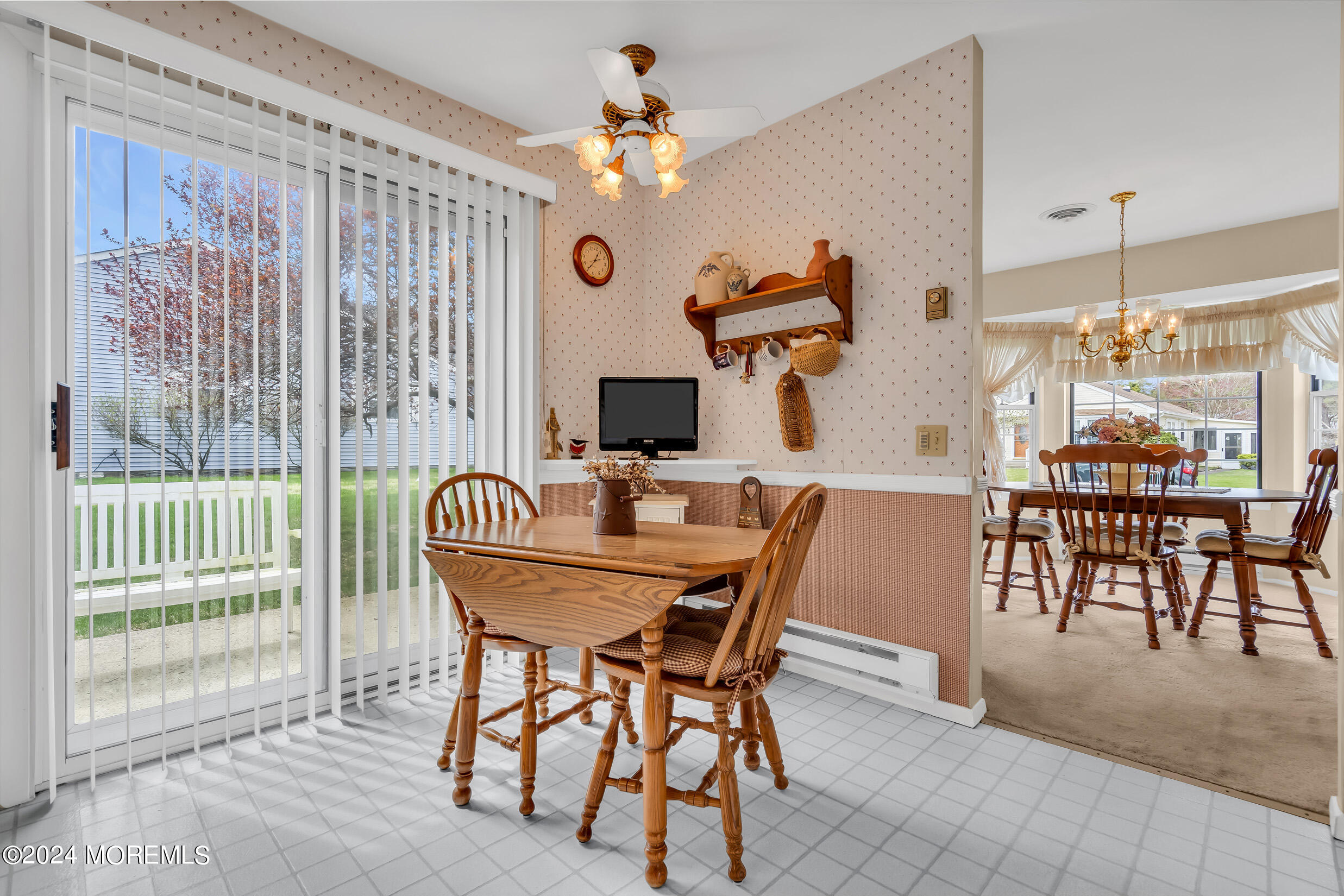 7 Amherst Road, Unit C Manchester Township, NJ 08759 - Photo 12 of 25 a view of a dining room with furniture window and outside view
