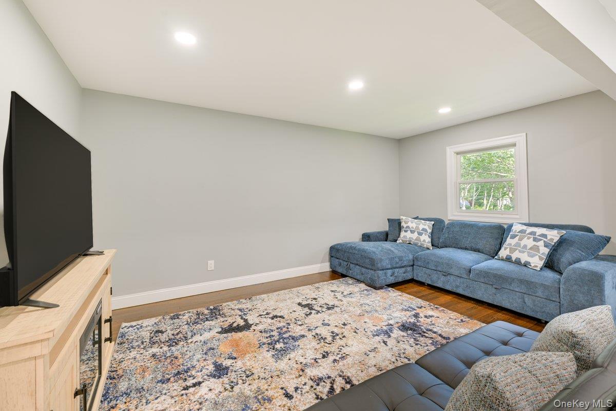 2 Fairview Road Hampton Bays, NY 11946 - Photo 5 of 17 Cozy but open living area with pull out sofa bed combo