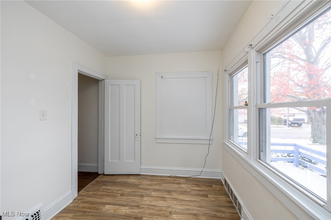 6003 Snow Road Parma, OH 44129 - Photo 17 of 28 Bedroom featuring new luxury vinyl plank floors.