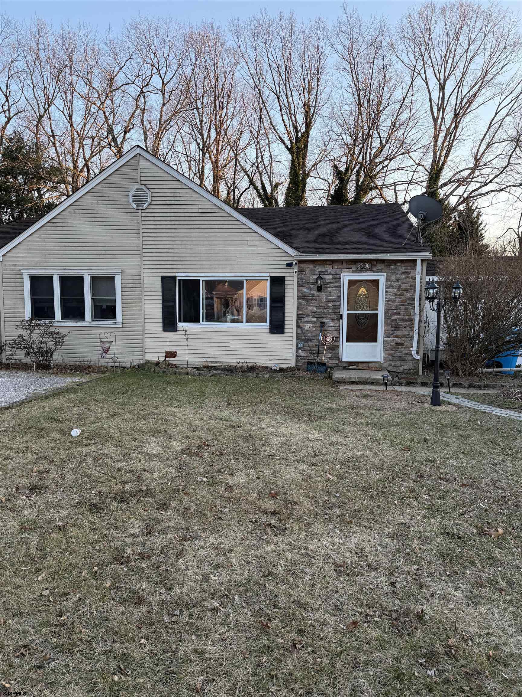 2530 Lexington Court Jackson, NJ 08527 - Photo 1 of 9 a front view of house with yard and trees
