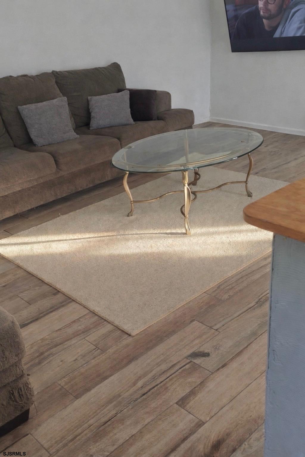 2530 Lexington Court Jackson, NJ 08527 - Photo 7 of 9 a living room with couches and kitchen view