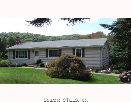 45 Foot Hills Road Durham, CT 06422 - Photo 1 of 1 a view of a house with a yard and potted plants