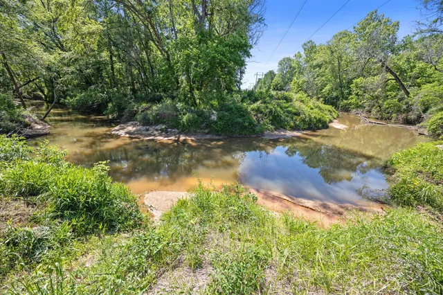 a view of a lake with outdoor space