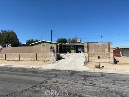 a view of a back yard with a house