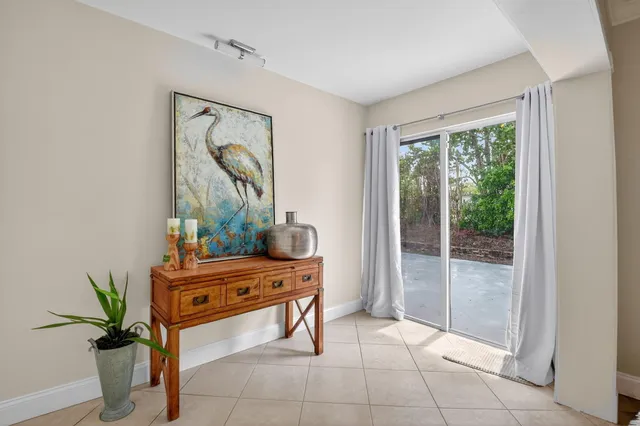 a room with furniture and a window