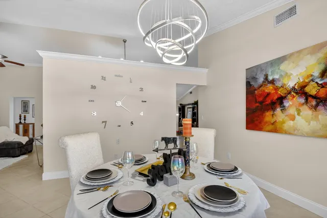 a table room with a table and chairs