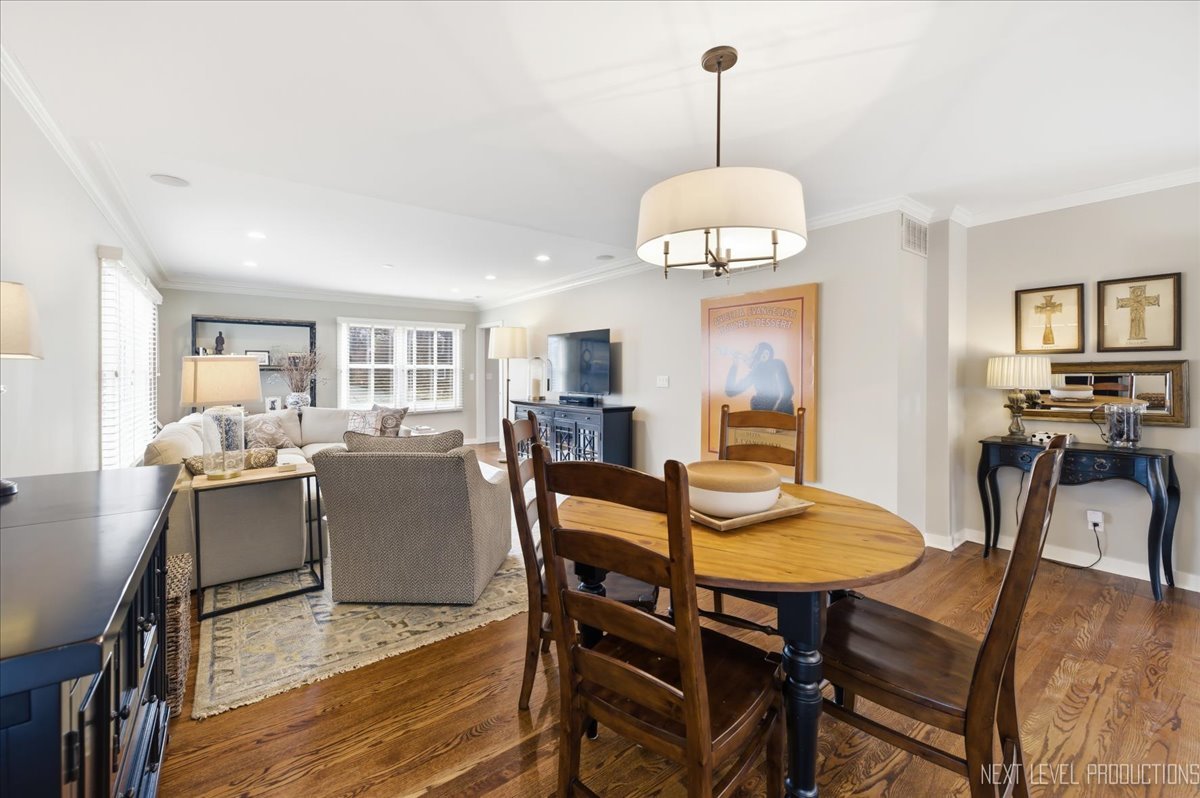 629 Peck Road Geneva, IL 60134 - Photo 13 of 38 a view of a dining room with furniture window and wooden floor